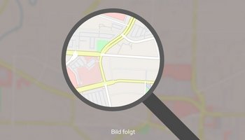 Das Bild zeigt eine orange gekleidete Frau mit einer ambelis Filterbrille. 