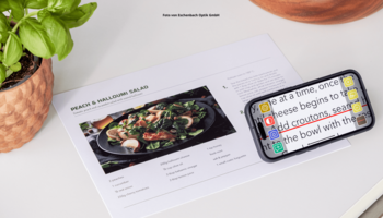 Das Foto zeigt die elektronische Sehhilfe optaro® von Eschenbach Optik.